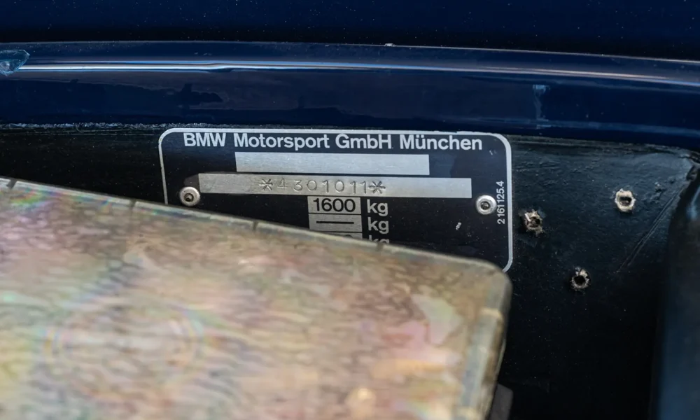 10037